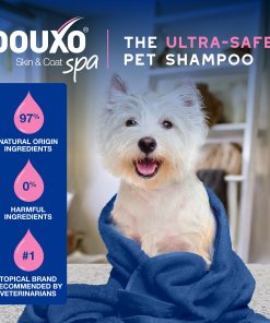 A dog in a towel, with text above reading DOUXO Skin and Coat SPA, the ultra-safe pet shampoo.